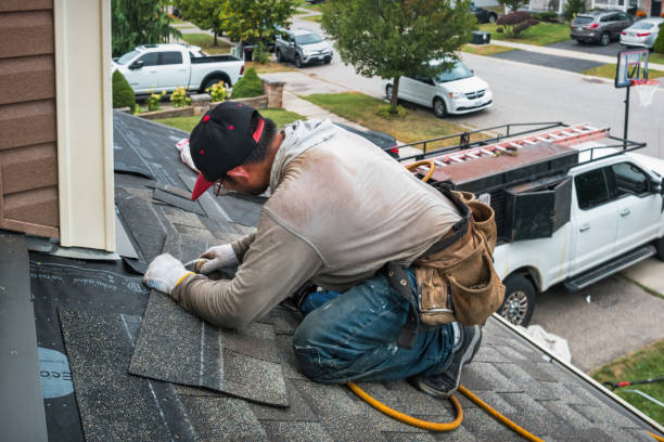 Professional Flat Roof Repair technician working in DeWitt, MI